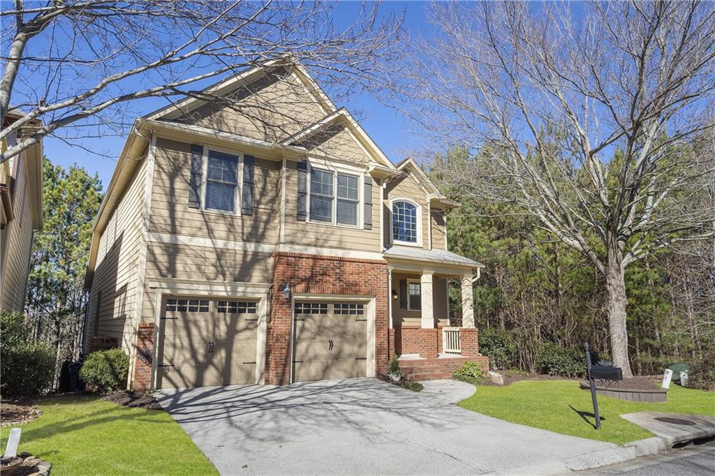 This spacious, move-in-ready home is perfect for anyone seeking main-level living, comfort, access to Lake Lanier and Buford Dam's sandy beach and swimming area. The primary suite is conveniently located on the main level, complete with a sizable en-suite bath and walk-in closet. Upstairs, you'll find four generously sized bedrooms and a loft entertainment area perfect for homework, home office, movie or game nights. Inside, the freshly painted Aesthetic White walls create a bright, modern feel. Home is complemented by several new light fixtures, while hardwood floors throughout eliminate the need for carpets. The updated kitchen boasts a spacious island, generous pantry, and seamless flow into the family room, making it a perfect hub for daily living and entertaining. The recently finished daylight basement (in 2024) offers private access and is ideal for multi-generational living. It features a 6th bedroom, a full bath, and a large home gym or yoga studio outfitted with 3/8" rubber flooring, mirrors and 3 high-speed fans. The main basement's Coretec luxury vinyl flooring is waterproof, durable, and resistant to wear and tear, ensuring it's ready for anything. Step outside to a covered patio and low-maintenance, wooded, fenced backyard for ultimate relaxation. Located near Lake Lanier, this home is a dream for nature lovers. Close to Habersham Marina or take advantage of shared-boat access less than five miles away at Bald Ridge Marina. Buford Dam Park, with its beach, swimming and picnic areas, is under two miles away. You'll also enjoy the convenience of downtown Cumming's vibrant shopping and dining scene, plus quick access to GA 400, Northside Forsyth Hospital and top-rated schools. Don't miss the opportunity to make it yours!