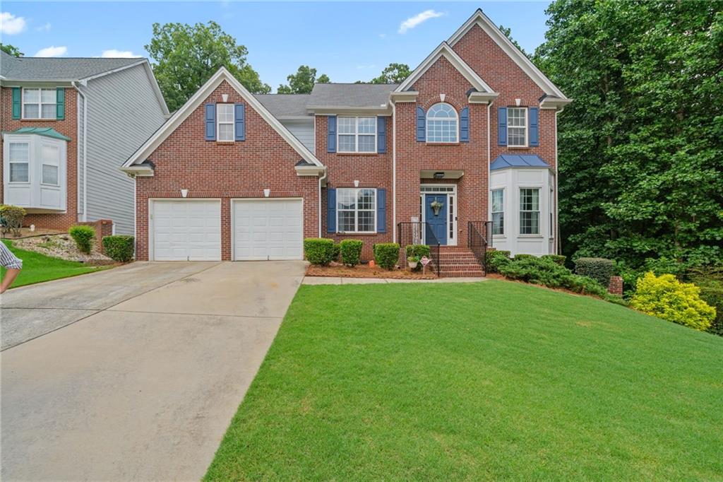Welcome to your dream home! This stunning 6-bedroom, 3.5-bathroom residence offers a perfect blend of space, comfort, and modern amenities. With 5 full bedrooms on the second floor, there's plenty of room for family and guests. Step inside to find a newly updated kitchen featuring brand-new appliances, making meal prep a joy. The main level showcases beautiful hardwood and tile floors, complemented by fresh paint throughout, creating a bright and inviting atmosphere. The spacious living areas include a separate living room that can easily serve as an office, providing flexibility for your needs. The finished basement is a fantastic entertainment space, complete with a pool table and pre-plumbed for a sink, ideal for hosting gatherings or enjoying family time. Outside, you'll find a fenced-in backyard, perfect for privacy and play, along with a screened-in covered porch that invites relaxation and outdoor living. With a two-car garage, you'll have plenty of storage and parking space. This home is truly a must-see, combining modern updates with ample space for everyone to enjoy. Schedule a tour today!