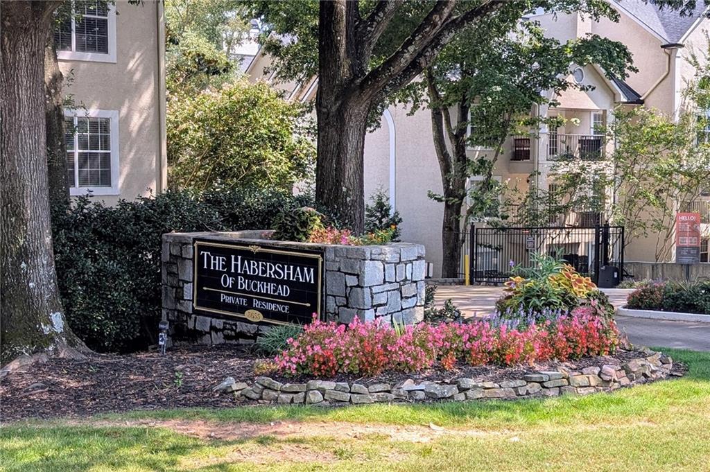 Discover one of Buckhead’s best values. Stylish 2BR/2BA condo with modern finishes and great amenities- pool, gym, clubhouse, and dog park) Open living area features wide-plank LVP flooring, wood-burning fireplace, and kitchen with white cabinetry, stainless appliances, and view to living room. Oversized primary suite includes walk-in closet, en-suite bath, and flexible nook for office/dressing area. Split bedroom layout offers privacy with second bedroom, walk-in closet, and direct bath access. Relax on the covered balcony. Deeded parking by the elevator plus. Well-managed community with lower fees than most Buckhead condos. Minutes to Chastain Park, Lenox, Phipps, and major highways/MARTA.