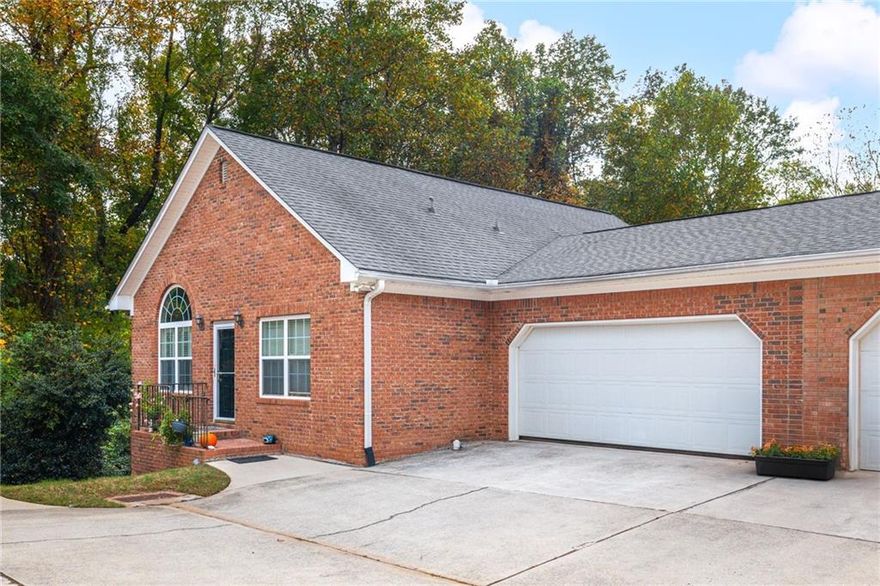 Excellent opportunity for this end-unit one-level ranch style condo with rare unfinished basement! Located in Magnolia Lane, this 2 bedroom 2 full bath property has an inviting and modern floorplan featuring a large fireside living room open to both the dining room and kitchen. Off the dining room is a wonderful deck overlooking the private and wooded common area - perfect for entertaining and cookouts! Two bedrooms on the main level including the primary bedroom with a large private bath w/double vanities and tons of closet space! Off the primary is a small sitting room that would make an ideal home office. Additional bedroom on main level with full bath great for family, guests, or an additional home office or craft room!! One of the most functional areas of the property is the large unfinished daylight basement with walk-out access to the backyard. The basement is perfect for storage and could easily be finished to include a 3rd full bath, additional bedroom, and large media/entertainment room. Magnolia Lane is a delightful community with a neighborhood pool and excellent location near downtown Marietta, Smyrna, restaurants, shops and more!!