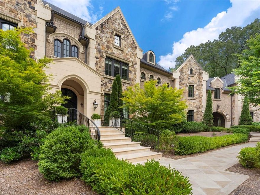 Spectacular custom English Manor home in coveted Winterthur Estates in Sandy Springs at the end of a cul de sac on 2.78 acres. Stone and brick exterior. New architectural roof added in 2020. Just 10 minutes north of Buckhead, Winterthur Estates is a best kept secret on the Chattahoochee River. Includes tennis and basketball courts. Exceptional open living environment with a massive kitchen, family room with a vaulted ceiling and kitchen with 12-35 foot ceilings and a double marble island, Wolf and Sub Zero, catering kitchen, huge walk in pantry and breakfast room. There are 7 fireplaces, 5 on the main level. Spectacular owners suite on main with sitting room and fireplace, doors out to covered loggia, dual dressing rooms, marble and stone bath. Dramatic two story library with fireplace across from the dining room. Each secondary bedroom is a suite upstairs. Covered outdoor Viking kitchen next to pool site privately situated off of the main level. Or change out the tennis court for a lawn with pool. Elevator to all floors including 3rd floor private bedroom suite or office. Separate au pair suite and an extended stay guest apartment with full kitchen. Two covered loggias with fireplaces off of the living room and on the terrace level. Recently finished terrace level with 14 foot ceilings and glass across the back opening to loggia and fireplace, game room, wine cellar, gym and spa bath, new bar and theater room. 4 car with motor court. This is an incredible opportunity to have an almost new English Manor home for this price on this much land. Cannot be replicated at this price. Surrounded by estate homes and in Sandy Springs with access to shopping and dining.