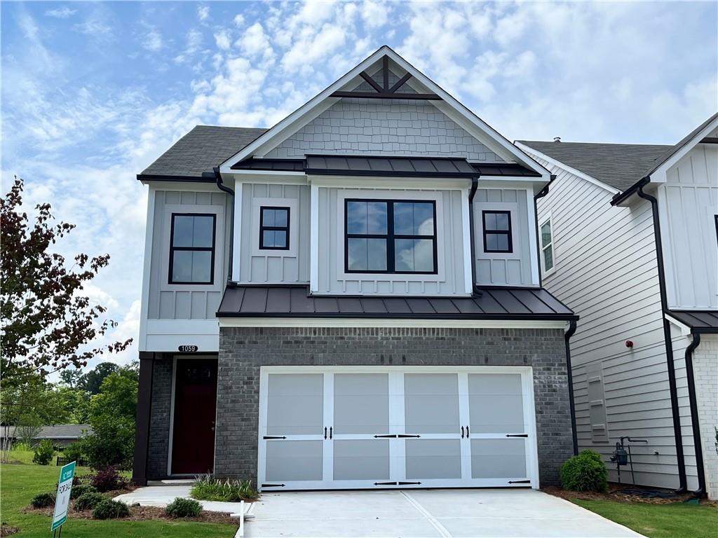 Located in the Historic City of Marietta GA. Just minutes from vibrant downtown, this new construction home offers a range of high-end upgraded features included in the finishes. Thoughtfully designed with large windows that embrace natural light, this home creates a bright, open atmosphere and a more resilient, energy- efficient living space. Enjoy luxury plank flooring, soaring 9-foot ceilings, and tall 8- foot doors throughout the main level. The gourmet kitchen features upgraded countertops, along with soft close cabinets doors and drawers for a refined finish. As an added convenience, the HOA includes lawn maintenance --Giving you more time to enjoy your beautiful new home and its surroundings. FHA 3.99% 5/1 ARM Promotion on this home using our preferred lender.