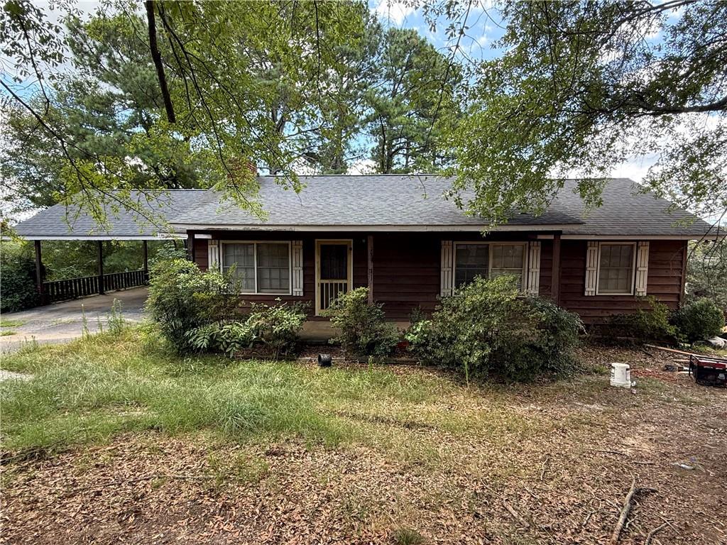 Rare Opportunity in Buford City Schools for a REHAB PROJECT! No HOA & Ideal for Redevelopment! New construction next door in the 1.5M+. Welcome to 3273 N Bogan Rd, a charming 3-bedroom, 2-bathroom single-family home nestled on a beautifully secluded 0.724-acre lot in the highly sought-after Buford City School District. Built in 1975 and offering 1,306 square feet of living space, this home presents endless potential. Whether you want to renovate, expand, or redevelop the property altogether. Surrounded by mature trees and tucked away from the road, the lot offers the perfect blend of privacy and convenience. Located just minutes from the Mall of Georgia, Lake Lanier, parks, dining, and with easy access to major interstates, this location is unbeatable. With no HOA restrictions, the possibilities are wide open. whether you're a homeowner, builder, or investor looking for your next project in one of Gwinnett County's most desirable areas. Don't miss this incredible opportunity to own a spacious lot with development potential in the heart of Buford! Second lot also available next door.