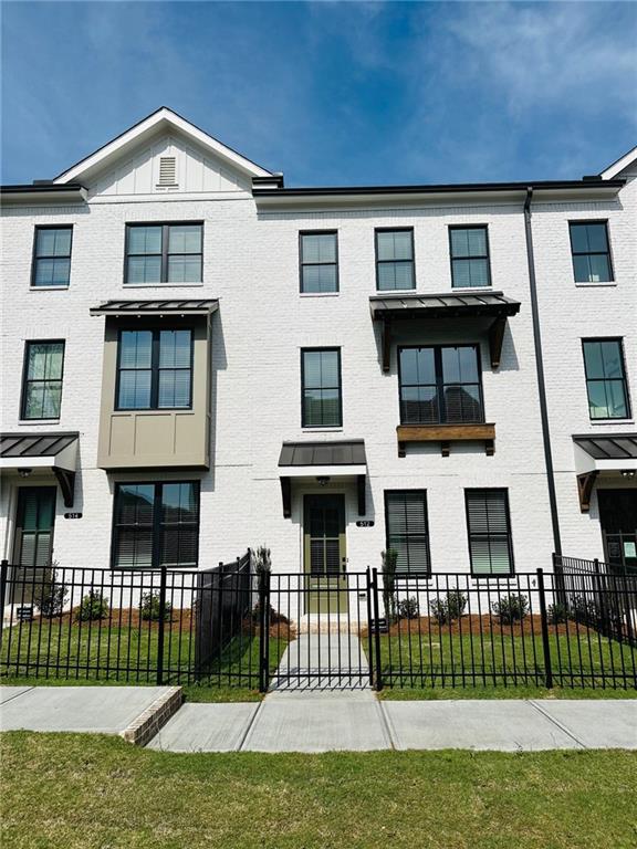 Explore the charm of urban living nestled within the lively Market Square District of Sawnee Village. Located in the heart of Cumming, GA, this community unveils a collection of impeccably designed townhouse tailored to your needs. Conveniently located across from the Cumming Elementary school and Otwell middle school, minutes from City Center and Cumming Library The Glendale Plan spans three levels, offering 3 bedrooms and 3.5 bathroom, 2 car garage and gated front yard. The terrace level welcoming bedroom accompanied by a beautiful ensuite makes an ideal space for guests or a home office. On the main level, open concept family room, dining area, and chef-style kitchen featuring 42” light grey cabinets and quartz countertops. Stainless-steel GE appliances, white backsplash, beautiful hardwood floors and spacious outdoor deck complete this modern yet functional area. The third level welcomes you to a spacious Primary Suite with a walk-in closet and a contemporary double-vanity bathroom, complete with a walk-in shower. Additional bedroom with its private bathroom and walk-in closet and laundry room with washer and dryer included complete this top-level. Half rent for the month of October 2025.
Agent owner.