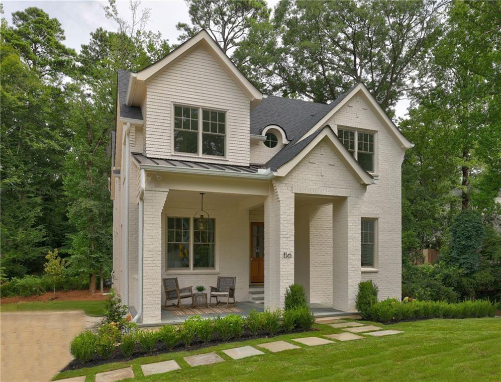 Come see this perfect new home in the heart of Peachtree Hills. Meticulously crafted by Rob Garrison Builders the 4-sides brick 3-story home sits perfectly on a quiet street. The curb appeal is designed to be both classic and striking — and it delivers. Walking distance to Peachtree Battle shops and restaurants, the Duck Pond Park and Peachtree Hills Park, the 6-bedroom home combines generous light-filled spaces, thoughtful architecture and flow, carefully curated finishes, and a quality and attention to detail. Set on a big lot with a private, level backyard, there is plenty of privacy and room to run. Striking front windows and entrance create a bold statement and invite the light in. The home has both grand and cozy spaces and rooms flow seamlessly throughout the three floors. Main Level: Big covered front slate porch, entry foyer, formal dining room. Stunning chef’s kitchen w/10ft island, Thermador, and separate sun filled breakfast room. Scullery/butler pantry with beverage fridge and prep sink plus custom shelved walk-in pantry. Huge family room with beamed ceilings and custom limestone fireplace and wall of glass that invites you out to the large rear covered porch with masonry fireplace. Separate study or guest wing on the main level includes a full bath. Upper Level: Spacious primary suite with trey ceilings, a stunning owner's bath and huge dressing area. The wide and bright upper hall leads to three large secondary bedrooms with big closets and two custom fitted baths and a cozy reading or homework nook. The carefully considered laundry layout maximizes storage, light and counter space. Terrace Level: Oversized 2-car drive-under garage with workshop and additional bike/stroller storage space. Mudroom entry with coat closet. 6th private bedroom suite. Giant daylight recreation room with wet bar. Easy wide driveway. Flat backyard with room to spread out and go!