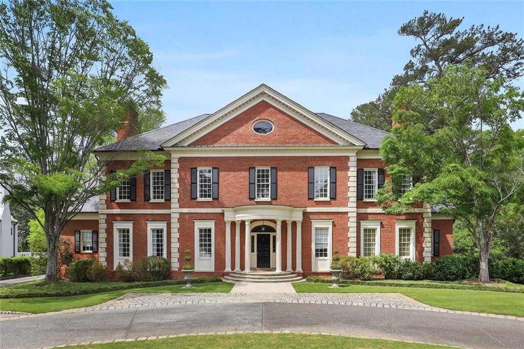 Gorgeous Buckhead home on sought-after and coveted Blackland Road. Thoughtfully designed by Duane Stone, this home sits on a private 1.6+/- acres. Entrance foyer leads to oversized living spaces ideal for entertaining. Kitchen offers stainless steel appliances, marble counters and opens to the keeping room with French Doors that lead to the patio overlooking the pool and park-like backyard. Oversized master on main with dual baths & dual walk-in closets. Upper level hosts 4 bedrooms, 4 en-suite baths + bonus room, ideal for playroom. Separate bedroom and full bath over the 3 car garage- ideal for an in-law suite or au pair suite. Terrace level consists of recreation room, media room, exercise room, guest suite with en-suite bath. Manicured grounds consists of pool, level backyard, 3 car garage and circular drive.