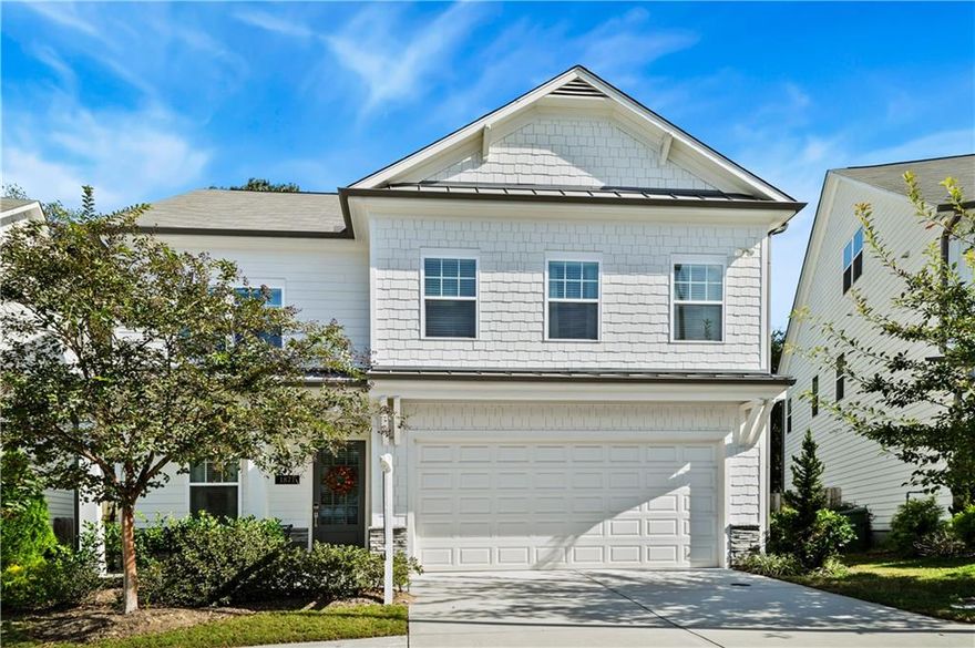 Seller to give Buyer $10,000 toward buying down Buyer’s rate or toward closing costs. Buyer must close on or before December 12, 2025 in order to receive this incentive. Welcome to 1871 Commons Place, a stunning like new construction home that is only 4-years-old. Built by Brock Built Homes in the intimate Main Street Commons community. Nestled in a private cul-de-sac of just 15 farmhouse-inspired residences, this property combines timeless charm with today’s modern conveniences in one of Atlanta’s most sought-after neighborhoods.
Step inside to a warm foyer and formal dining room before entering the bright, open-concept main level. The gourmet kitchen is a showstopper, featuring herringbone Bianco Carrara marble backsplash, Caesarstone pure white quartz countertops, a huge center island, and stainless steel KitchenAid appliances. Custom cabinetry and 5” wide-plank hardwood floors add a touch of elegance, while the breakfast nook and fireside living room create the perfect spaces for everyday living and entertaining. From the main level, enjoy access to a private, fully fenced backyard with a stone patio ideal for outdoor dining and gatherings.
Upstairs, a spacious loft-style family room anchors three bedrooms, including a luxurious primary suite with a spa-inspired ensuite featuring a soaking tub, separate walk-in shower with a custom bench, dual vanities, water closet, and a huge walk-in closet. Two additional bedrooms, a full bathroom, and a conveniently located laundry room complete the second floor. The tankless water heater provides instant and endless hot water for unwinding in the tub or in the shower.
The third level offers 485 sq. ft. of unfinished space with plumbing and electrical already roughed in place—the perfect opportunity to create an in-law suite, home office, or additional bedroom, instantly increasing both living space and home value.
Curb appeal abounds with the home’s modern farmhouse exterior, while the location offers unbeatable convenience. Situated in the heart of Atlanta’s Upper Westside, you’ll enjoy quick access to The Works, Westside Park, The Battery, and major interstates. Located in the highly regarded Bolton, Sutton, and North Atlanta school districts, this home truly has it all—style, function, and location.
Don’t miss your chance to own this pristine, move-in ready gem in one of Atlanta’s fastest-growing communities!