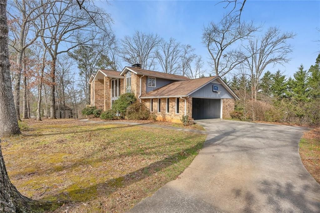 Photo of 1113 Honeysuckle Drive, Canton, GA 30114 (MLS # 7704605)