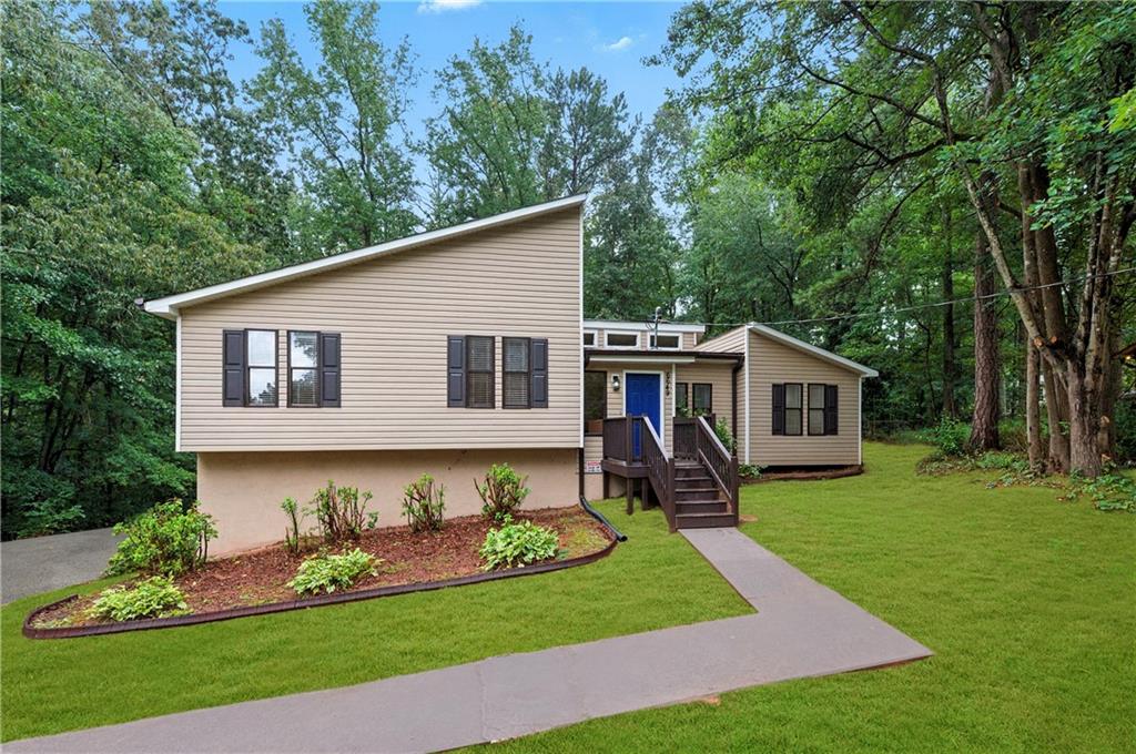 Rare Renovated Split Level with In Law Suite. No HOA and No City Taxes. Finished Basement.
One of the best values in the new City of Mableton. This fully renovated split level home is move in ready, fits your lifestyle, and delivers unbeatable affordability. Get qualified for rates as low as 4.99% and enjoy seller paid closing costs with the right offer. Ask for details.
The location is unbeatable. Only 20 minutes to The Battery for Braves games, dining, and late night fun, 20 minutes to downtown Atlanta, and 25 minutes to Hartsfield Jackson Airport. Close to the Mableton Epi Center with aquatics, gym, co working space, and event facilities. Surrounded by new shops, restaurants, parks, the Silver Comet Trail, and everyday conveniences.
Inside you will find an open floor plan with soaring ceilings, bamboo floors, fresh designer paint, a brand new kitchen, and fully updated baths. The spacious owner’s suite features a modern spa like bathroom.
The finished basement includes a private in law suite with its own kitchen, living room, bedroom, bath, and separate entrance. Perfect for rental income, multigenerational living, or a home business.
Enjoy outdoor living on your private rear deck, a large yard that is easy to maintain, a roomy storage shed, and parking for more than five cars.
With no HOA, no city property taxes, and a prime location in a fast growing community, this home is a rare find. Tour it this weekend before it is gone.
FHA, Cash, Conventional and VA financing available.