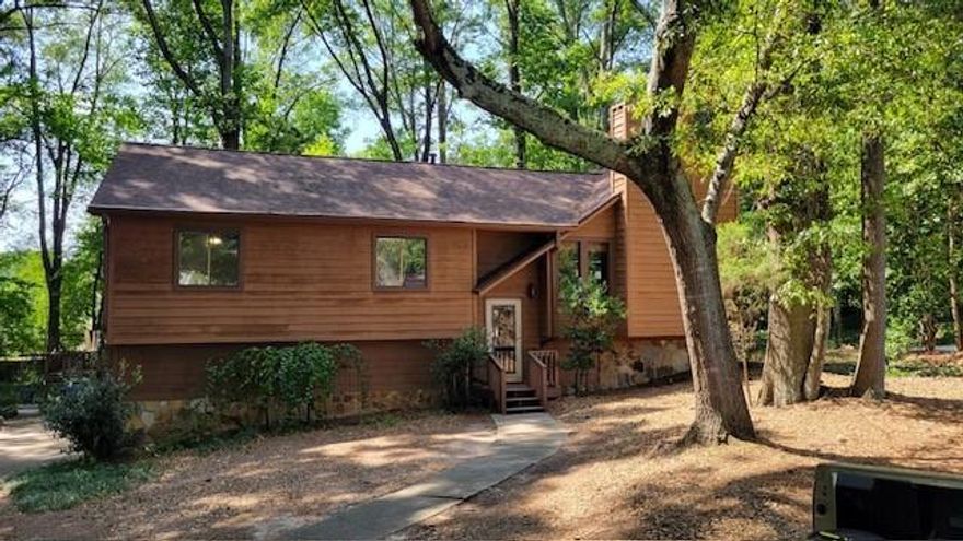 Price Refreshment!
Come see this great home!
Now is the time to buy! Sellers are ready to take your good offer!
New updates, new price. Home is a large lovely wooded lot at the end of a cul de suc. New lvp floors, beautiful new kitchen granite counter tops. This home offers a primary ensuite with 2 other bedrooms on the main floor and another full bath. The deck is a sanctuary for morning coffee and evening parties. Downstairs is the perfect space for a teen(s), or you could transform it into the ultimate in-law suite. It is a wonderful space for a work out room, a studio, or a private space for you to work with a separate access to the outside. Large 2 car side entrance garage with extra space for tools, art supplies or hobby supplies.
Owner's survey has this lot at .58 of an acre!