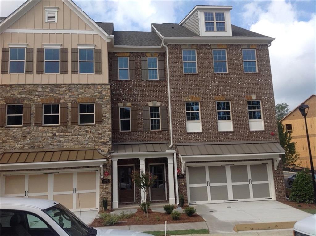 Gorgeous Townhome in quiet Gated Community, built August 2015! 4 Beds/3.5 Baths. Wide Open Floor Plan. End Unit with Private side entry on lower level bedroom/living area. Large size bedroom on lower level with full bath that can be used as office, media room, teenager bedroom, etc. Granite Countertops with plenty of counter space for entertaining! Stainless Steel Appliances, Washer/Dryer, Pantry, Large Open Kitchen that overlooks Family Room with Hardwood Floors. Recently installed carpet upstairs. and new HVAC unit installed last year. Water is included in HOA. Close to Perimeter Mall, Marta and plenty of shopping.
