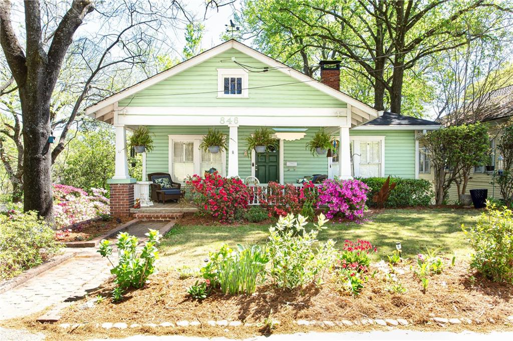 PRICE REFRESHMENT !!! Just newly painted through out the whole house!! You will fall in love with this bungalow in the heart of highly sought after Grant Park !! This home harmonizes historic charm along with elegance on the quiet and friendly street right across from Grant Park and Zoo Atlanta with your own personal driveway! This three bedroom two bath home has cathedral ceilings with an open concept living area , separate dining room and an oversized master bedroom which has access to the back patio ! The kitchen and master bath have been updated while third bedroom has custom built shelves which could be used as a home office as well as a bedroom. The backyard is any nature lover's paradise with a coy pond, garden and gazebo and all the peace and quiet you can ask for in the heart of it all ! There is an inviting front porch for coffee in the mornings and a private drive for parking for several cars which is a bonus living in the city along with a daylight crawlspace for extra storage! Come check out this amazing home where it's is a walk to Grant Park and Zoo Atlanta , quick stroll to restaurants and shopping along with the Belt Line. It's the perfect setting for a friendly neighborhood to walk your furry friend but have all the entertainment you can ask for within a few miles!