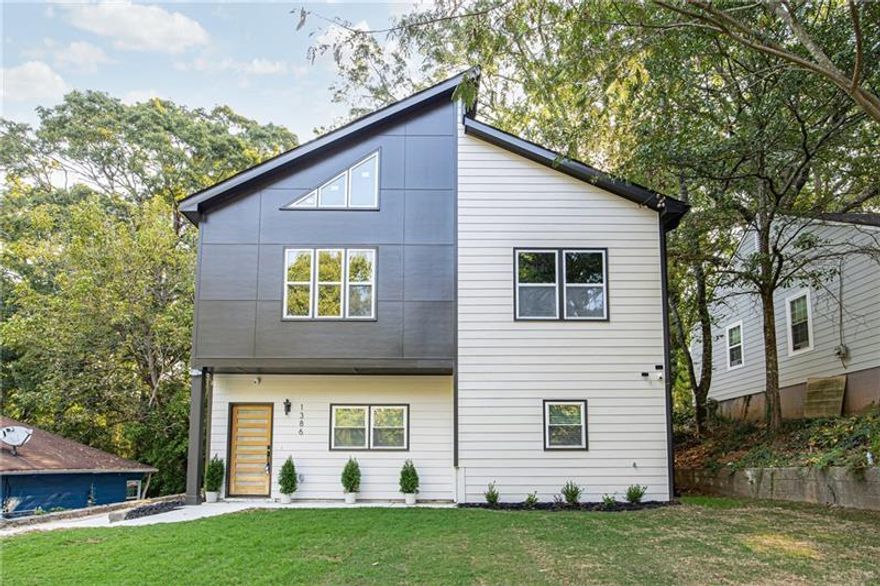 Welcome home to this beautifully renovated 4-bedroom, 3-bath home located in the highly sought-after Venetian Hills area of Atlanta. This stunning property offers modern upgrades with timeless design, just minutes from the BeltLine, Downtown Atlanta, Mercedes-Benz Stadium, and the vibrant dining and shopping of Lee + White and West End. Inside, you'll find an open-concept floor plan designed for both style and function. The gourmet kitchen features granite countertops, brand-new stainless steel appliances, and custom cabinetry, all flowing seamlessly into the dining and living areas   perfect for entertaining or everyday living. Each of the three full bathrooms showcases designer tile work, with a spa-inspired primary bath offering a large tiled shower, double vanity, and oversized walk-in closet. The main level includes a versatile bedroom that can be used as a guest room or a private home office, providing flexibility to fit your lifestyle. Upstairs, a spacious laundry room adds convenience, while generous secondary bedrooms offer plenty of space for family or guests. With its blend of modern finishes, abundant natural light, and thoughtful renovations, this home is move-in ready and built for today's lifestyle. Don't miss this incredible opportunity to own a fully updated home in one of Atlanta's fastest-growing communities   where history meets modern living and convenience is at your doorstep.