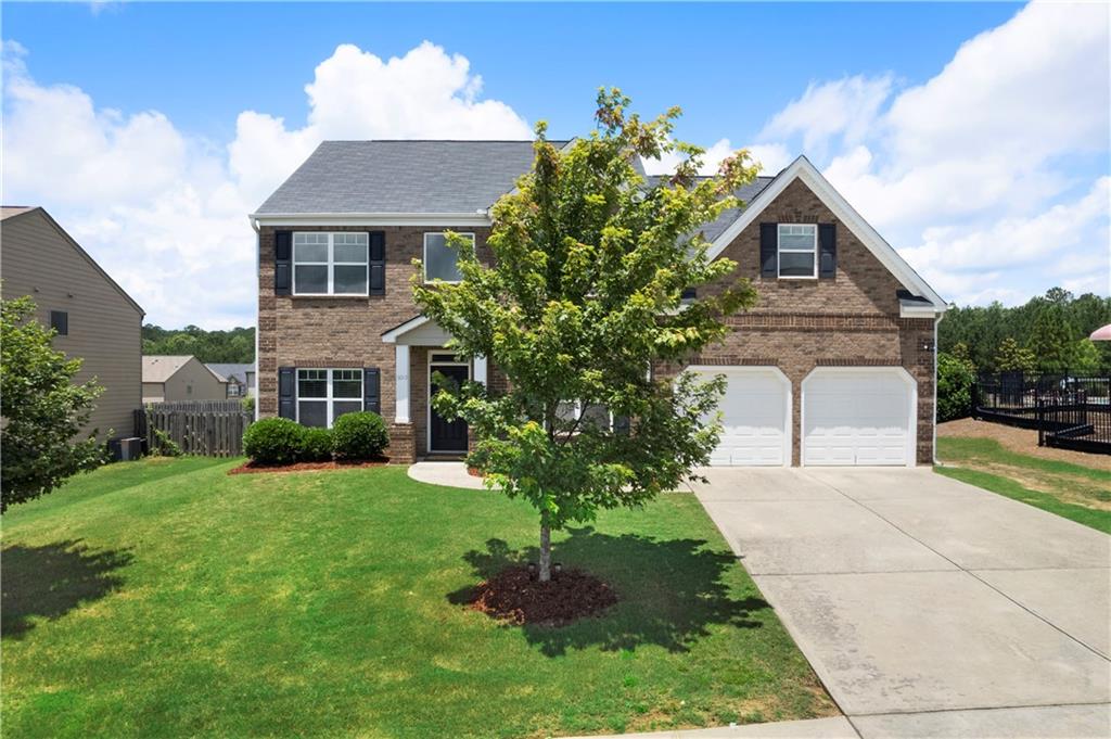 Located in the sought-after Reserve at Logan Pointe this beautifully maintained traditional brick home offers 5 spacious bedrooms and 3 full baths, including a guest bedroom conveniently located on the main level. The heart of the home is a large kitchen featuring granite countertops, a breakfast bar, and ample cabinetry—perfect for both daily living and entertaining. Enjoy separate formal living and dining rooms that provide elegant gathering spaces. Upstairs, the lavish master suite boasts a serene sitting area, a luxurious bath, and a generous walk-in closet. The level yard offers great outdoor potential, ideal for play, gardening, or relaxing evenings.