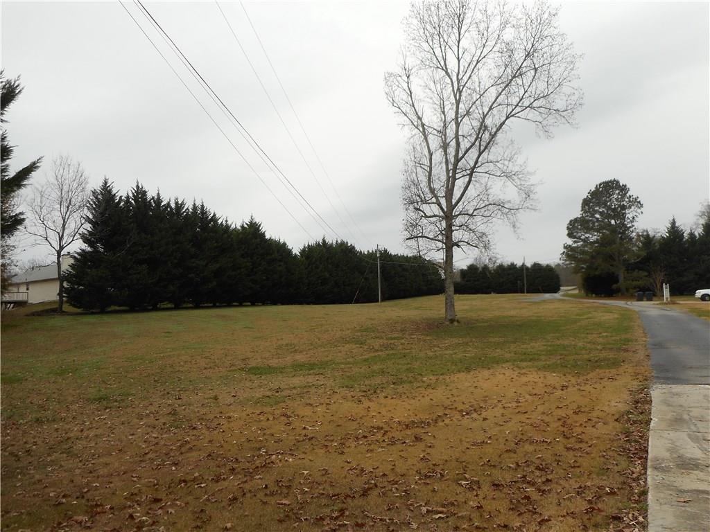 Level, cleared, buildable lot in much sought after location!! Septic tank in place for a 3 bedroom home. Adjacent 1 acre lot available also.