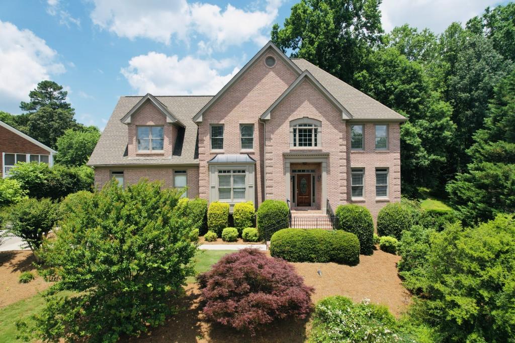 Beautiful 2-Story Custom Home on the golf course* 3-sided Brick* 30-year Architectural Roof* Large Private Deck* Real Hardwood Floors - Foyer, Dining Room, Kitchen & Breakfast, Hallway* Large Eat-in Kitchen with double oven & Granite Countertops* Large 2-Story Family Room with Fireplace* Private stairway to the Master BR* Large Master Suite with Fireplace* Large secondary BR's* Unfinished Basement that is stubbed for bathroom* Beautiful Community Facilities* Swim Team* Dacula Schools* Convenient shopping & Restaurants* Easy Access to Hwy 316 & I-85* Mall of GA *Property Landscaping is included in the monthly Fee*