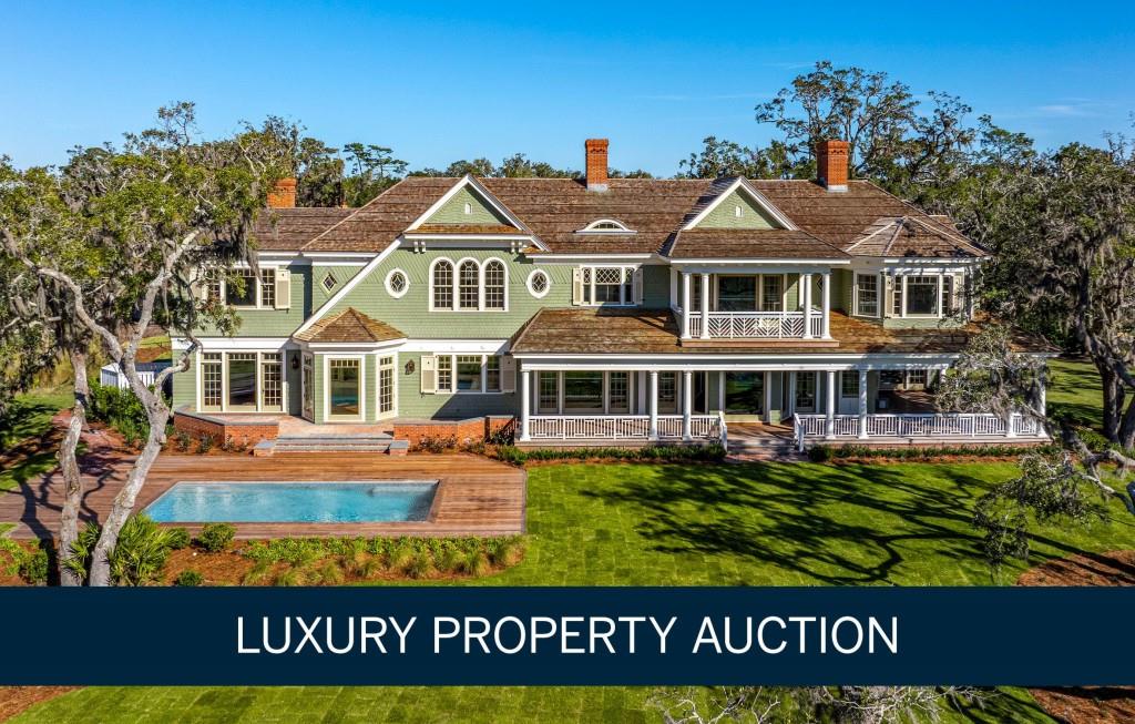 AUCTION BIDDING OPEN: Bidding ends 1/29. Previously Listed $30M. Current High Bid $7.1M. Showings Daily By Appt. Discover 'The House on King's Point', a masterpiece of design by world-renowned architecture firm Robert A.M. Stern Architects (RAMSA). Positioned within an exclusive gated enclave of a Sea Island Development on Saint Simons Island, offering exceptional privacy, this estate spans nearly two acres, boasting an unmatched sanctuary of seclusion and sophistication. Newly constructed and never before lived in, the residence commands sweeping 270-degree vistas of Sea Island's Seaside Golf Course, Lanier Point Bridge, and the Marina. Every element has been thoughtfully curated to evoke timeless elegance, with gracious spaces designed for refined living, entertaining, and retreat. Inside, a stately library, formal and informal living areas, a private gym, and an expansive upstairs sitting room with a superb view deck exemplify understated luxury. Additionally, a 2,500-square-foot attic/flex space offers even more room for your dream vision. Outdoors, the impeccably manicured grounds feature a saltwater pool, private pickleball court, and lush gardens. Crafted fireplaces, artisanal stone and hardwood finishes, and a chef's kitchen with premium appliances culminate in a residence where tradition and modernity converge in perfect harmony. All of this and more, just steps away from Sea Island Golf Club, a club honored by highly respected commentators as the finest family resort in the world, makes for a residence that redefines luxury in the Golden Isles. Application rights to the Sea Island Club convey with the property.