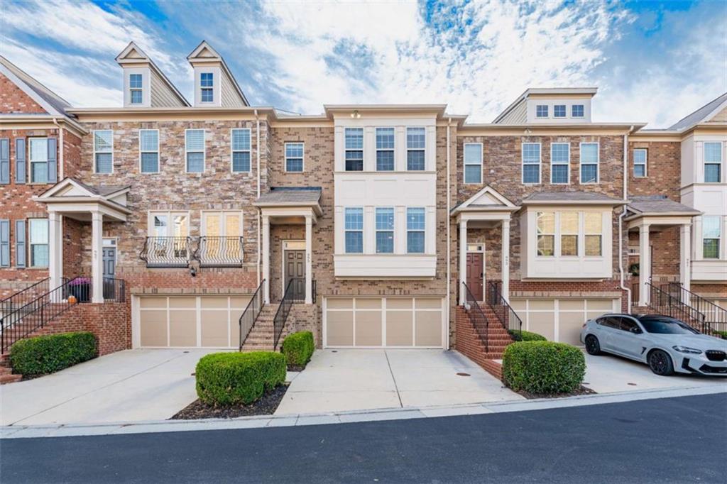 Exquisite 4 bedroom 3.5 bath home located in the quiet gated community Buckhead Park at Lenox of Atlanta! This beautiful home features an open and bright floor plan with tons of natural light and fantastic views. The large family room features a grand stone fireplace and hardwood floors. The kitchen has beautifully cherry-stained cabinets, stone countertops, and stainless appliances with an island. The master has a double-trayed ceiling with a sitting room. The master bath features double vanities with stone counters, a glass-enclosed walk-in shower, a large soaking tub, and walk-in closet. The secondary bedrooms are spacious and bright. There are covered porches on each of the 3 levels giving you great views and privacy to enjoy the outdoors. This home has everything you need plus easy access to major highways! Great Schools!