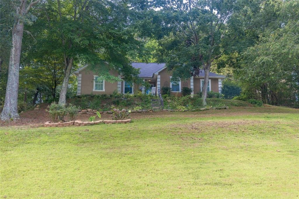 Charming Ranch-Style Home in Sought-After Community!
This beautifully maintained 4-bedroom, 2.5-bath ranch home is located in a highly desirable subdivision offering top-notch amenities, including a community pool and tennis courts. Enjoy the ease of single-level living—no stairs throughout the home! The open floor plan features durable LTV flooring, a cozy fireplace, and a modern kitchen with granite countertops. Laundry is conveniently located on the main level. The gorgeous landscaped backyard provides a peaceful outdoor retreat perfect for relaxing or entertaining.