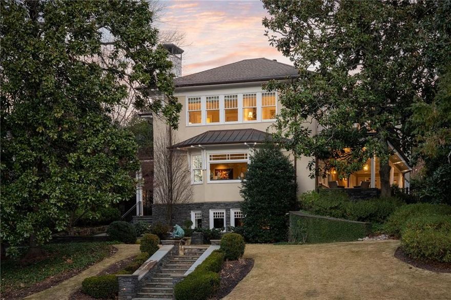 This exceptional Ansley Park residence was designed for both grand entertaining and effortless everyday living!  In 2011, the current owners commissioned RLS Construction for a complete and meticulous rebuild, extending even to the foundation. Ross Design Architects reimagined the façade with refined sophistication, enhancing its presence and curb appeal while honoring the home’s timeless historic character.  A dramatic foyer introduces the soaring 23-foot hall, flanked by an elegant formal living room and a large formal dining room, each graced with quarter-sawn oak floors and intricate mahogany inlay. The gourmet Siematic/Miele kitchen is a culinary masterpiece, featuring dual dishwashers, a wine refrigerator, warming drawer, induction cooktop, and more—flowing seamlessly into the inviting family room and onto an expansive covered porch, ideal for year-round gatherings. Upstairs, four luxurious ensuite bedrooms include a private primary suite with sweeping skyline views, a boutique-style walk-in closet with center island, spa-inspired bath, and a serene private terrace. Preserved 1912 heart pine floors add warmth and character to the upper level, complemented by a spacious laundry suite. The versatile lower level offers every modern amenity: a state-of-the-art media room, fitness studio, guest suite with full bath, wet bar, climate-controlled wine cellar for 1,100+ bottles, and a secure safe room. Whole-home automation by Control4 ensures effortless control of lighting, audio-visual, security, and sound. Additional highlights include an elevator servicing all three levels, a rare three-car garage, smart irrigation fed by a private well, and extensive storage. Located on a premier street, the home is within walking distance to Colony Square, High Museum, ASO, Atlanta Botanical Garden, Piedmont Park, Beltline and numerous restaurants!