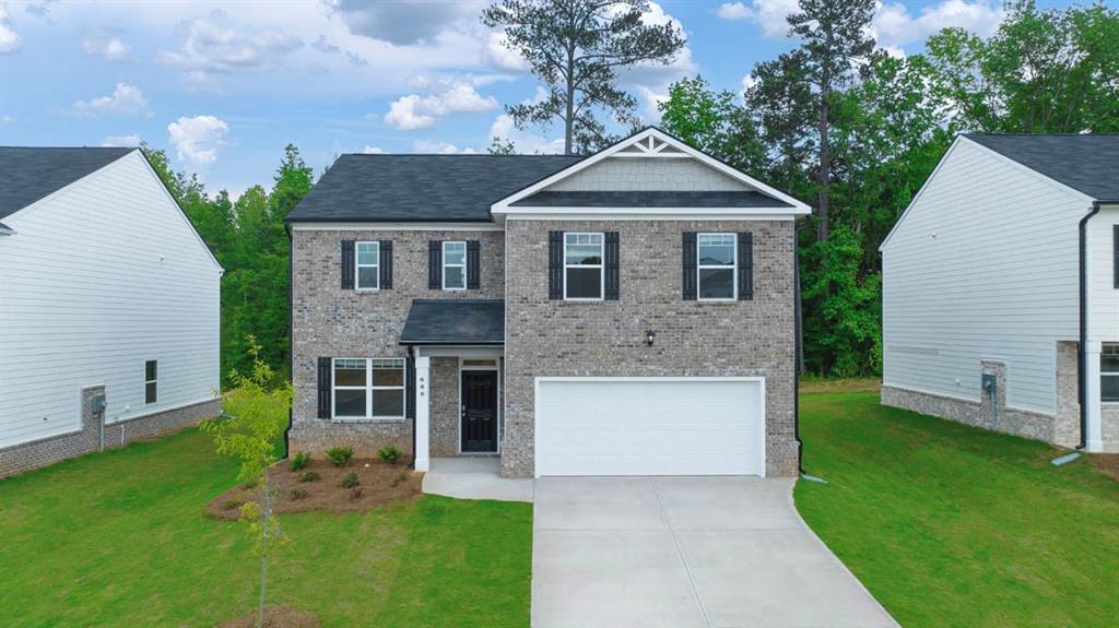 CLOSING COST PAID and special financing with Preferred Lender! Residents will also enjoy POOL, CABANA WITH GRILLING STATION, PLAYGROUND, WALKING TRAILS and DOG PARK! MINUTES FROM I-75 AND I-675. The "GALEN FLOOR PLAN" is a two-story design with 4 bedrooms, 2 full baths and a powder room covering 2,338 sq ft. Open the door to a flex room that could be a dedicated home office, a formal dining space for hosting and entertaining, or a secondary living room. The island kitchen flows into a casual breakfast area and effortlessly transitions into the spacious family room. Plus, there is an oversized pantry to stock with favorites. Upstairs includes a large bedroom suite that easily fits a king-size bed. The private ensuite bath is a must see, featuring extra space for storage, shower, separate garden tub and dual vanities so you don't have to share. The three secondary bedrooms each have generous closets and windows that help bring in natural light. A convenient laundry upstairs completes this traditional design. And you will never be too far from home with Home Is Connected. Your new home is built with an industry leading suite of smart home products that keep you connected with the people and place you value most. Photos used for illustrative purposes and may not depict actual home.