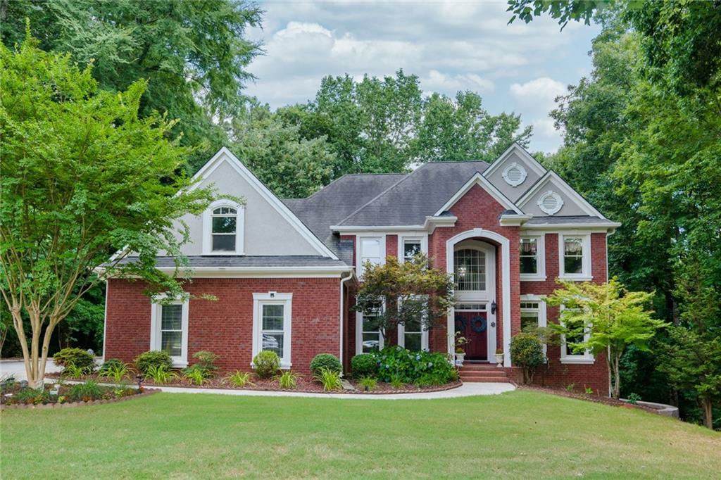 Beautifully well maintained John Weiland Home located on Cul-De-Sac with 3 Side Brick /3 car Garage w/side entry /Full unfinished Basement. Large family room/spacious dinning/office(den)/ 2 story foyer opens up to family room . Beautifully rebuilt backyard with large double deck/private wooded backyard for entertaining. This house has the most beautiful SUNSET view from family room/Sunroom w/stunning views!! Freshly painted outside and inside throughout. Hardwood floor on main. Open floor plan with lots of window. Large Kitchen with plenty of cabinets/pantry. Upstairs features 4 bedrooms/3 bathrooms include a Jack and Jill /a single private bath. Master bedroom w/walk-out deck features tray ceilings, ensuite with his and hers walk-in closets, huge master bathroom with huge retreat room(can be multi-functional room). Well maintained the front yard with irrigation system. Chattahoochee Run Subdivion offers amazing amenities such as clubhouse with gym, 4 divided tennis courts, pickle ball court, basketball court, sand volleyball court, community garden, walking trail, pool with Swim Team. Just minutes from shopping, grocery stores, dining, easy access to I-85.
