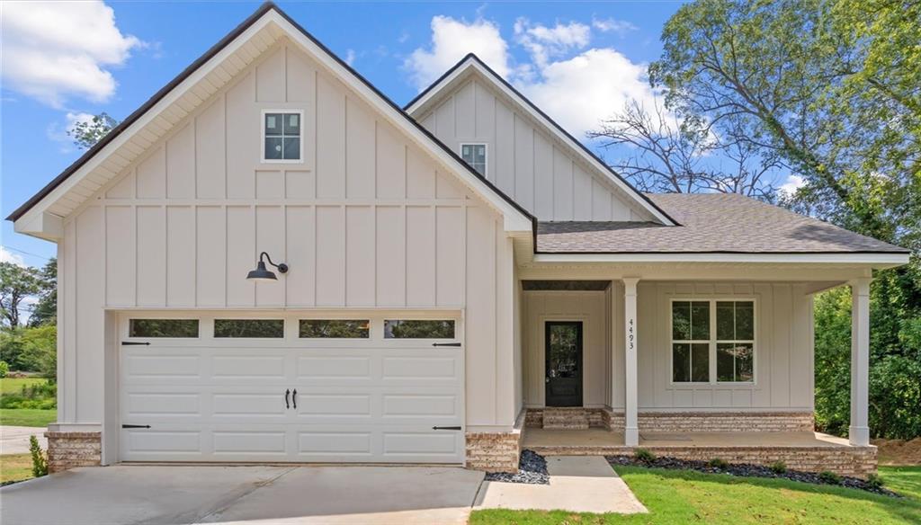 Experience the charm of Downtown Tallapoosa in this beautifully crafted 3-bedroom, 2-bathroom home with a full unfinished basement, built by Tritt Quality Homes & Construction. Inside, you'll find a spacious great room with soaring vaulted ceilings and fireplace that effortlessly connects to the eat-in kitchen, complete with granite countertops, a timeless white subway tile backsplash, and brand-new stainless steel appliances including a range, microwave, and dishwasher. The oversized owner's suite offers a peaceful retreat with vaulted ceilings and a walk-in closet, while the rocking chair front porch invites you to slow down and enjoy quiet mornings. Built with both style and efficiency in mind, this home features LVP flooring, Hardie plank siding with brick accents, spray foam insulation, and a soft, neutral color palette throughout. With no HOA, you'll enjoy the freedom to live as you choose, and peace of mind comes standard with a 1-year workmanship and 10-year structural warranty.