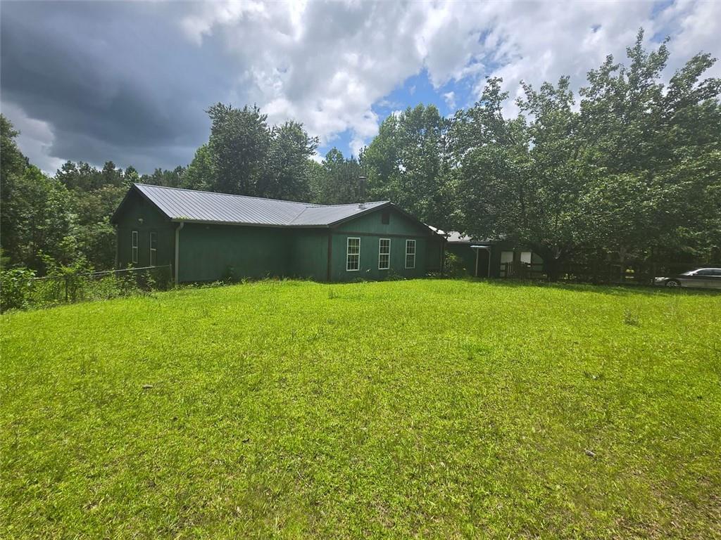 MOTIVATED SELLER, Investor Opportunity This is a modular home taxed as a single family residence on 6 acres of undeveloped land in Cobb county . Don't miss out , you can either Fix and flip this property .Bring your contractors or handyman and show this property some love. Don't let this opportunity pass you by. Bring your offers today.