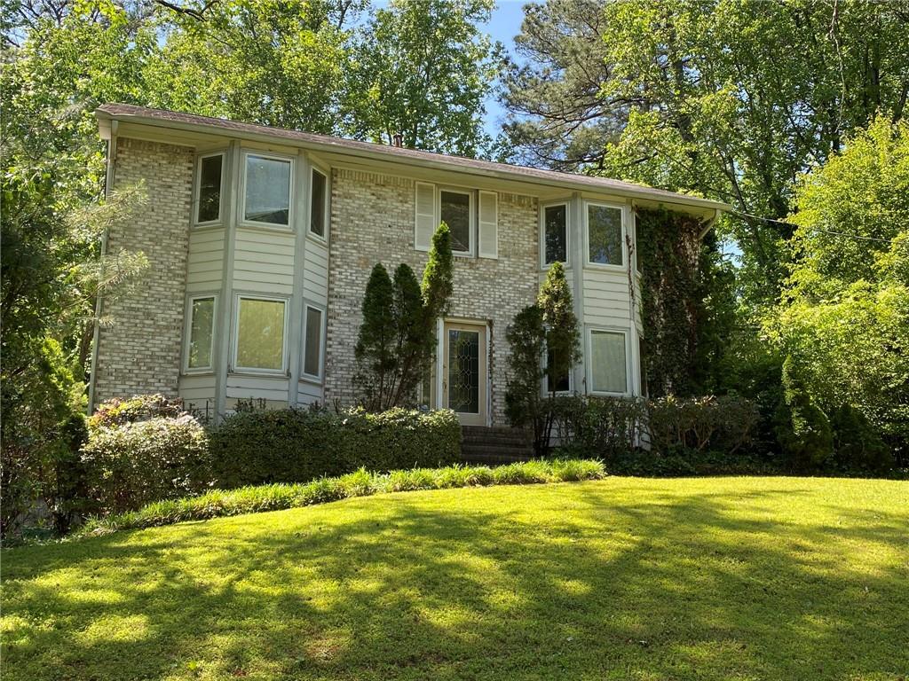 Great Opportunity on wonderful quiet street off Harts Mill Road in Brookhaven. Large two story on private lot. Good bones but needs significant updates and renovations.