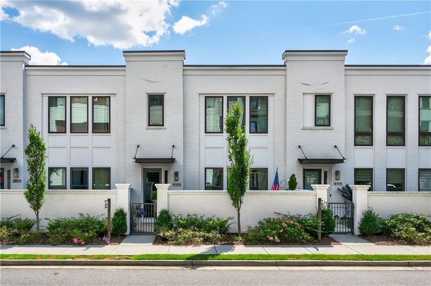 PRICED BELOW APPRAISED VALUE! Welcome to your better-than-new dream townhome in the heart of Halcyon, one of Atlanta's most vibrant and walkable communities, built by the respectable luxury builder, Monte Hewett. Perfectly positioned with direct access to everything Halcyon has to offer, you're just steps
away from Trader Joe's, top-rated restaurants, breweries, boutique shopping, a luxury movie theatre, state-of-theart gym, golf simulator, outdoor games, walking trails, dog park, and year-round events that bring neighbors
together. This home blends modern luxury with community living in a way that few properties can - offering not
just a home, but a lifestyle.
Inside, you'll find a thoughtfully designed layout filled with natural light, hardwood flooring throughout, custom
lighting, and upscale finishes. The main level features decorative ceiling beams across the living room, a separate
dining area, and a stunning chef's kitchen with quartz countertops, stainless steel appliances, soft-close cabinets,
and exceptional storage space. Upstairs, all three spacious bedrooms feature their own en-suite baths and large
closets making this unlike any other townhome in the Halcyon community! The luxurious primary suite has an
oversized walk-in closet, double vanity, soaking tub, and a large walk-in shower with built-in seating. The 2-car
garage is a true standout, with soaring ceilings, a private storage room, and reinforced overhead storage that holds
up to 1,500 pounds. Enjoy your morning coffee on the charming front porch or end the evening with wine by the
firepit before walking to dinner. All of this comes with Forsyth County taxes and an Alpharetta address! You don't
want to miss out on this opportunity!