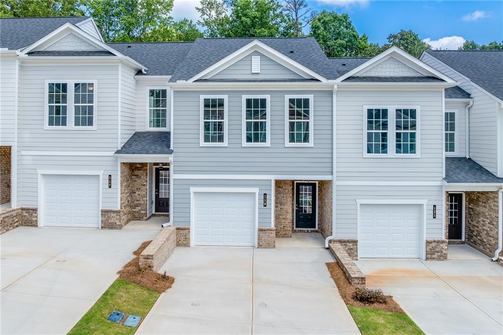 Welcome to Chimney Oaks Golf Course Community. Our Thomas floor plan is a 3-bedroom, 2.5 bathrooms townhome with an open floor concept on the main floor and all bedrooms located on 2nd floor. The kitchen features grey cabinets, granite countertops, pendant lighting, electric range and stainless-steel appliances. Directly looking into the family room enjoy a cozy linear fireplace with tile surround. LVP flooring on the entire 1st floor is also included. The master
bedroom has a spacious walk-in closet with a comfortable master bathroom separate tiled shower/tub with double vanity. Come and enjoy
all the amenities this community offers!!! Golf course, Jr Olympic sized pool, tennis courts, pickleball, fitness center, and clubhouse with a
conference room and restaurant. This home is move in ready! Bring your motivated buyers. ***Ask the onsite agent about special
incentives when using our preferred lenders