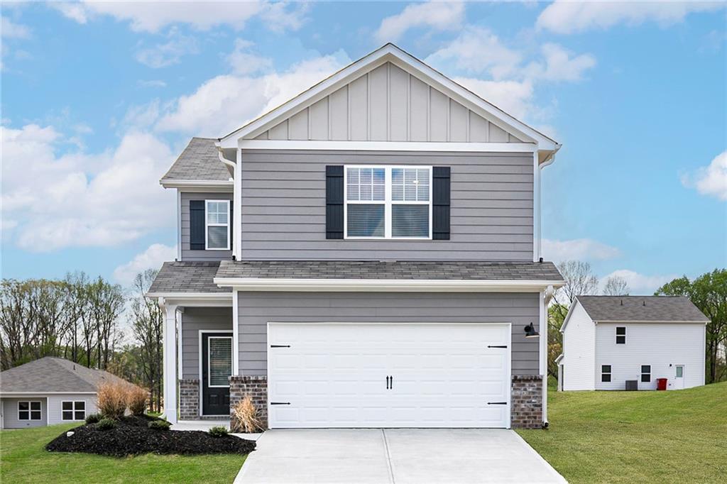 Introducing the Charleston —a family-oriented yet stylish 3-bed, 2.5-bath residence in the heart of Lake Preserve at Jackson Trail. With a bright, open-plan living space and an upgraded kitchen at its center, this home blends efficiency and comfort. Upstairs, the owner's retreat features a spa-style bath and generous walk-in closet, complemented by secondary bedrooms and a second-story laundry. Every detail, from granite countertops to a front-yard landscaping package and covered porch, is ready for move-in.