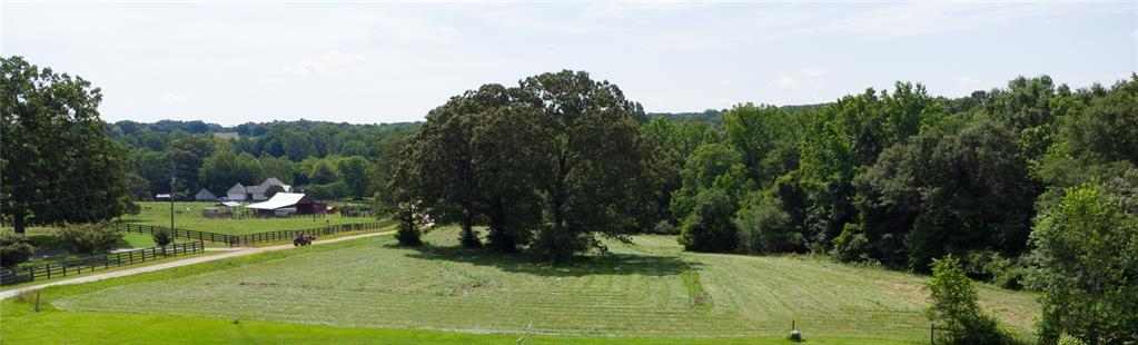 Exceptional 32-Acre Estate Opportunity in Commerce, GA – Ideal for Equestrian Living!
Discover the perfect blend of privacy and convenience with this expansive 32-acre tract located just 12 minutes from the popular Tanger Outlet Mall in Commerce, GA. This beautiful property offers a unique opportunity to build your dream estate or equestrian retreat.
Nestled in a peaceful, natural setting, the land features a serene creek—an excellent water source for animals—and plenty of space for pastures, barns, and riding arenas. Whether you're looking to create a horse farm or a private family estate, this property offers endless potential.
Enjoy easy access to I-85, making travel to Atlanta, Athens, or surrounding areas a breeze, while still savoring the quiet charm of rural Georgia living
Don't miss this rare opportunity to own a large parcel with incredible potential in a fast-growing area!