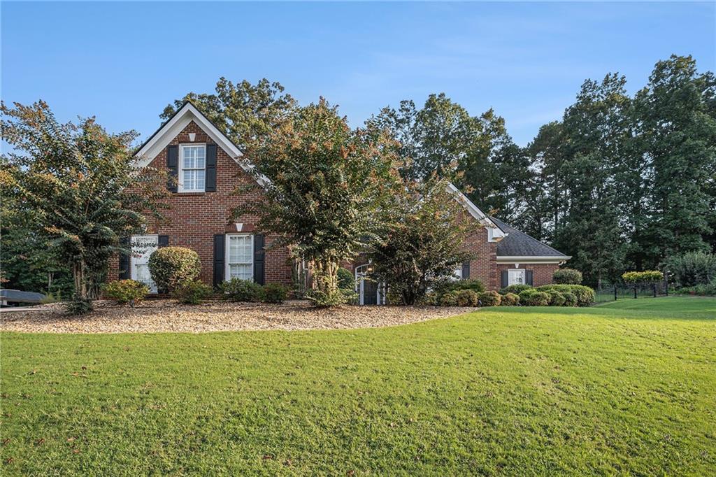 This beautiful 4-sided brick home in E. Irwin Place offers the perfect blend of space, warmth, and function—ready for its next owner. The thoughtful floor plan features the primary suite on the main level, along with two additional bedrooms connected by a Jack-and-Jill bathroom. A private fourth bedroom above the garage, located on the opposite side of the home, is ideal for guests, or a home office.
At the heart of the home, you’ll find a spacious kitchen with a center island, wall oven, tile floors, white cabinets, and a cozy keeping room—perfect for gatherings. Hardwood floors throughout the main level add warmth and character to the living spaces.
From the sunroom, step out onto the patio and enjoy a large backyard, perfect for entertaining, gardening, or simply relaxing in your own outdoor retreat. A two-car side-entry garage. Lastly the conveniently located near I-20, shopping, dining, and schools, this home combines comfort, functionality, and an excellent location.
Don’t miss the chance to make this your next home—schedule a showing today! Up to $22,000 in down payment assistance available to qualified homebuyers through Preferred Lender!