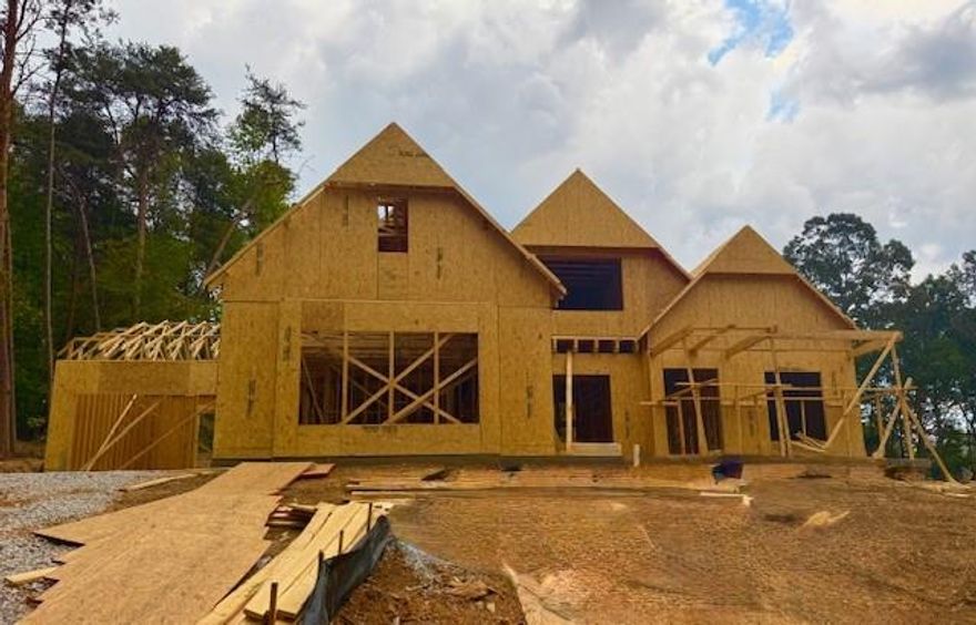 UNDER CONSTRUCTION! The Evans B is a beautiful open-concept floor plan featuring 4 bedrooms with 2 on the main level. The charming craftsman-style exterior welcomes you home with its architectural details and double-pane wood windows throughout. A 4-car garage provides ample parking and storage. Enjoy a spacious kitchen with a large island and open views of the family room, keeping you at the center of the activity. The master suite boasts a large shower and an expansive walk-in closet. The vaulted family room includes built-in bookcases and a cozy wood-burning fireplace, with hardwood floors throughout the main level. Upstairs, you’ll find two generously sized secondary bedrooms, each with its own private bathroom, plus lots of storage and a finished room over the garage. All our homes come with 1 year builder warranty, providing peace of mind as you embark on the home ownership journey. Beautiful home and amazing community. This home is currently under Construction, with estimated completion date scheduled for February 2026. All our homes come with 1 year builder warranty, providing peace of mind as you embark on the home ownership journey. Beautiful home and amazing community. Bercher Homes says it best. Great Homes Great Life.