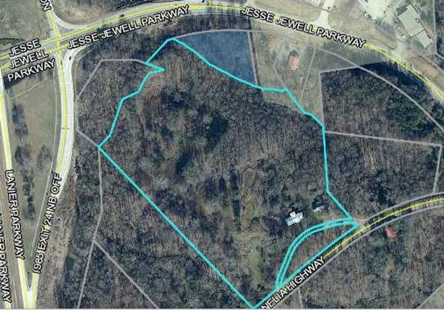 POTENTIAL COMMERCIAL! 16.25 +/- spacious acres with frontage on Jesse Jewell and Old Corneila Hwy. Premium location with endless possibilities. This property is located right at I-985 exit 24, with sewer access nearby. Additional acreage assemblies possible. Two homes on property.