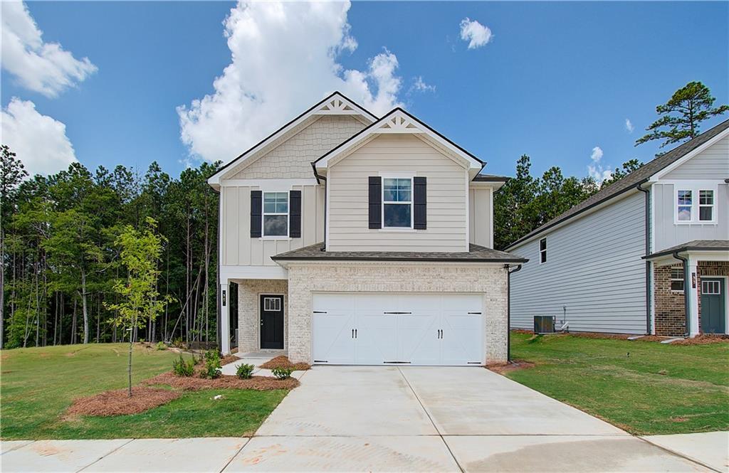 Welcome to the Reagan at Homesite 5 in the desirable Enclave at Evergreen community by DRB Homes! This beautifully crafted 4-bedroom, 2.5-bathroom home offers the perfect balance of style, comfort, and modern functionality.
The open-concept kitchen is a centerpiece of the home, featuring a large island that overlooks the dining area and family room—ideal for hosting gatherings or enjoying cozy family nights.
Upstairs, the expansive owner’s suite is a private retreat with volume ceilings, a spacious walk-in closet, and a luxurious en-suite bathroom complete with dual vanities, a soaking tub, and a walk-in shower. A versatile loft area upstairs provides additional space for an office, playroom, or second living area.
Extra conveniences include a main-level laundry room and a mudroom located just off the garage, designed to streamline your daily routine.
*Note: Photos may not reflect the actual home. Explore the Reagan today and envision your future in this exceptional home!*
Please note: If the buyer is represented by a broker/agent, DRB REQUIRES the buyer’s broker/agent to be present during the initial meeting with DRB’s sales personnel to ensure proper representation. If buyer’s broker/agent is not present at initial meeting DRB Group Georgia reserves the right to reduce or remove broker/agent compensation.