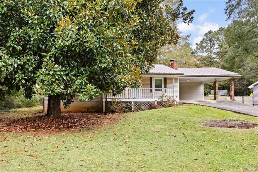 Welcome home to this beautifully renovated 3-bedroom, 2-bath ranch situated on a spacious, flat lot of over half an acre. Step inside to an open-concept floor plan that’s perfect for modern living. The updated kitchen features white cabinets, stylish countertops, a tile backsplash, and a cozy breakfast area—all with a view to the inviting family room. Enjoy abundant natural light and a brick fireplace that serves as the centerpiece of the living space.The primary bedroom is generously sized, offering plenty of closet space and a private ensuite bath. Two additional bedrooms are well-proportioned and share a hall bath.Outdoor living is a highlight of this home, with a large screened-in porch and an additional deck—ideal for relaxing or entertaining. The expansive, fenced backyard is flat and open, providing plenty of room for recreation or gardening. An outbuilding with power offers great additional storage or workspace options.Home is being sold as-is, presenting a perfect opportunity for investors or anyone looking to add to their rental portfolio.