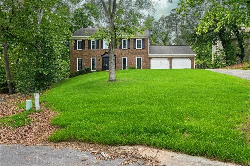 Discover this beautifully updated 4-bedroom, 2.5-bath traditional home tucked into a quiet cul-de-sac in the heart of East Cobb. Located in an established neighborhood surrounded by mature trees and well-maintained homes, 1911 Woodmont Ct NE offers both space and style in a highly desirable Marietta location.

Inside, you’ll find an open-concept layout filled with natural light, refreshed lighting, and upgraded flooring throughout the main level. The inviting living area flows seamlessly into the dining and kitchen spaces—perfect for entertaining or relaxing. The owner’s suite features a completely redesigned ensuite bath, offering a serene retreat at the end of the day. Three additional bedrooms provide flexible options for guests, office space, or family needs.

Enjoy a level backyard with space to host, garden, or play—plus a two-car garage and wide driveway for additional parking. Located just minutes from Harrison Park, Sweat Mountain Dog Park, Noonday Creek Trail, and convenient shopping and dining along Sandy Plains Road, the home offers both peace and accessibility.

Commuters will appreciate quick access to I-75, Roswell Road, and Downtown Marietta, while students are zoned for East Side Elementary, East Cobb Middle, and Wheeler High School. Buyers are encouraged to verify school zoning and explore programs through the Cobb County School District.

With modern updates, flexible living space, and a prime East Cobb location, this move-in-ready home is one you won’t want to miss. Schedule your showing today—homes like this don’t last long.