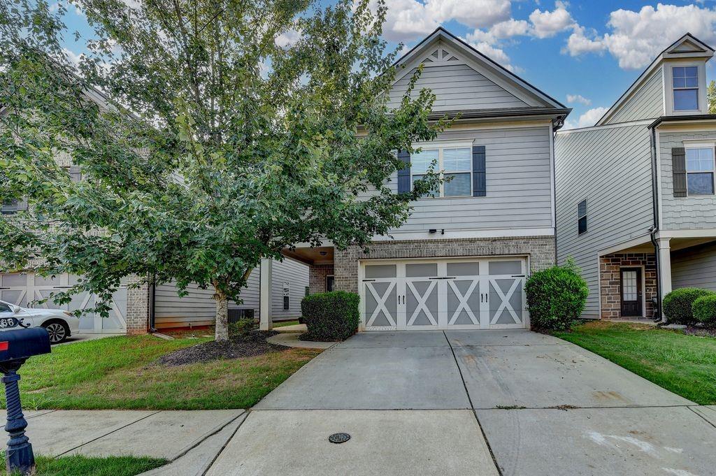Available for immediate move-in! This beautiful 4 bedroom, 2.5 bathroom Craftsman-style home features a dramatic two-story foyer that opens to a spacious family room. The gourmet kitchen is equipped with an oversized island, granite countertops, tile backsplash, stainless steel appliances, and recessed lighting. Hardwood floors extend through the kitchen, dining room, foyer, and powder room. Enjoy a large master suite with a luxurious bathroom that includes tiled floors, a tiled shower, and a tiled tub surround. Step outside to a covered porch, perfect for relaxing or entertaining. Located in the highly sought-after Millcreek School District, the community offers fantastic amenities including a pool, basketball court, playground, and a fun mushroom fountain. Don't miss this opportunity!