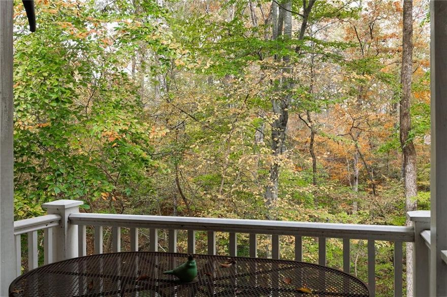 *******HOME FOR THE HOLIDAYS*******This condo is situated in a gorgeous setting. It's close to 285, Sandy Springs, and Smyrna's Truist Park. As
you turn onto Columns Drive off of Johnson Ferry Road, you will see the spectacular landscape of homes and people riding their bikes or jogging.
Don't worry, they have their own lane. Get ready to tour this cozy home that makes you feel as if you are in a treehouse. An open floor plan welcomes
you in, with closets galore. The home offers you a gas fireplace for those chilly winter nights. A sliding glass door beckons you onto the deck which is
surrounded by trees and nature. Privacy abounds. The primary suite has your very own walk-in closet and an ensuite. An additional bedroom can be
used as an office, a den, or a second bedroom with the second bathroom right down the hall. This bedroom also has a walk-in closet. And speaking of
walk-ins, there is also a laundry room with ample space. The kitchen has everything you need as the gas stove, microwave, dishwasher, and
refrigerator/freezer remains. Storage is no problem in the kitchen with 2 pantries! This home has new windows (2023) and new floors throughout (2025).
 What more could you ask for besides being in your new home for the holidays! To find this tucked away home, find a parking space (there are plenty)
and use the stairs on the right side of the building, going down. Take a left where the stairs split and at the bottom of the stairs go right. It is the 2nd
door on the left.  
*******Up to $11,000 in down payment assistance available to qualified homebuyers from Preferred Lender!*******