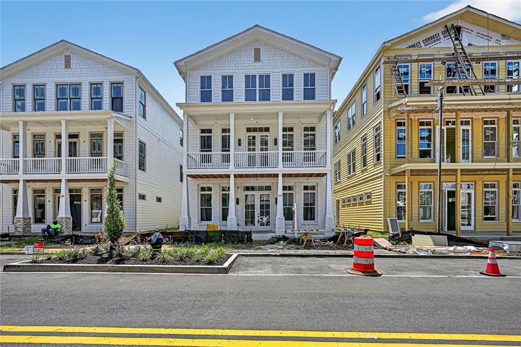 Fantastic opportunity to own a lucrative LIVE/WORK mixed use building! Named by MONEY Magazine as one the top walkable downtown districts in the entire nation, the location is second-to-none with a 5-minute walk to city center downtown Woodstock. Carefully curated choices by the city and local business owners have added extraordinary lifestyle values and the retail options, exceptional eateries, and music venues keep residents and visitors enthralled and engaged. Woodstock is a DESTINATION in and of itself. This amazing property showcases 2 condominium units, 2 Bedroom/2 Bath each unit and a functional Commercial space on the ground floor can have various uses - use to be approved by Developer. Short term rental, long term rental both allowed! Property can be fully owner-occupied, partially occupied or completely leased. Very convenient parking is available in the building’s 2-car garage on on the street in front of or behind the building. Subsidize your living or invest to own a piece of prestigious Adair Park!