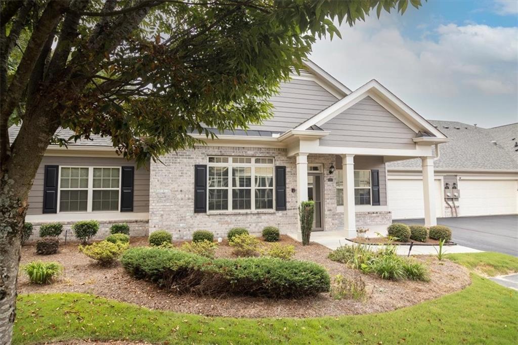 New listing in popular Orchards of East Cherokee. Enjoy a maintenance free lifestyle in an Active Adult Community. One owner-one level ranch. Private
rear unit with a welcoming covered front porch. This home features crown molding, granite kitchen countertops, gas range cooking, stained cabinetry, eating bar
and breakfast or keeping room off kitchen. Enjoy gas log fireplace in living room and open concept dining area. Two bedrooms include the primary suite
with tray ceiling, large shower, dual vanities and walk-in closet. Guest bedroom with tray ceiling and full bath. New hot water heater and roof replaced in 2020.
Generous unfinished storage space with walk up permanent stairs. Great Hickory Flat location with walking to shopping, dining and library with close by, new
Northside Cherokee Hospital. Near I-575, downtown Woodstock and Roswell.