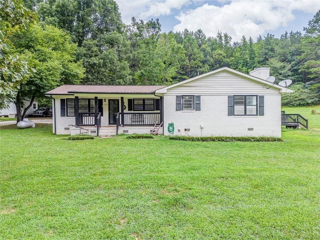 Tucked away from the hustle and bustle, this property offers unmatched peace and tranquility while still being just minutes from Indian Mountain ATV Park. Discover the perfect blend of seclusion and convenience with this 4-bedroom, 2-bathroom home nestled on 4 private acres in Cedartown.
Step inside to find a functional layout with an open-concept living and dining area that creates a warm, inviting space—perfect for everyday living and entertaining. Outside, you'll love the large side deck featuring a built-in bar, ideal for relaxing evenings or weekend gatherings. A separate storage building provides ample space for tools, equipment, or hobbies.
Whether you're looking for a quiet place to unwind or a private basecamp near outdoor adventures, this property has it all. Come enjoy the peaceful surroundings and make this serene retreat your own.