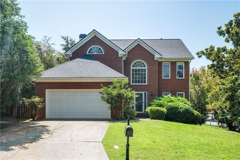 Great property in a top North Fulton school district features a two-story foyer, spacious dining and living rooms, a kitchen with breakfast bar and views to the family room centered on a cozy fireplace. It has gleaming real hardwoods throughout the main level with freshly cleaned carpet upstairs. The upstairs primary suite boasts a cathedral ceiling, ensuite bath, and walk-in closet. Secondary bedrooms are nicely sized. Enjoy the fully fenced backyard and level corner lot. The community amenities are a short distance away - tennis courts, swimming pool, and playground. Conveniently located to shopping, parks and restaurants. **Small pets (30 lbs max) allowed with owner’s permission; a pet deposit of $500 and $25/pet monthly fee applies. Combined tenant income must be 3x monthly rent. Each adult tenant must complete a $75 background check at their expense. Tenant must carry a renter's policy in the amount of $300,000 liability and $30,000 personal property. Smoking of any substance not allowed inside the home.