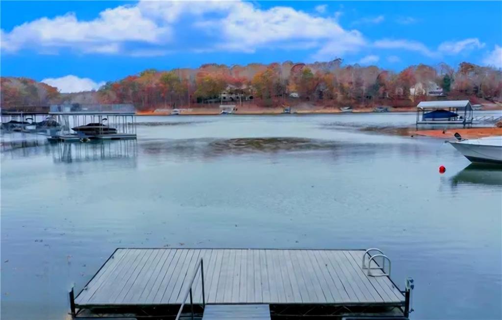 Beautiful lakefront lot located in Ridgewater on Lanier. You'll enjoy the convenience of its proximity to the community owned lot which features a swimming pool and tennis court. Soil test on hand. Perfect for your dream lake home!