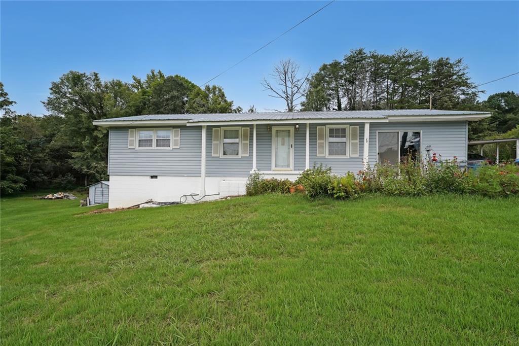 Welcome to 401 Springdale Road in Rockmart, a property with potential and important updates already in place. This 3-bedroom, 1.5-bath home offers 1,488 square feet of living space with a newer HVAC system installed in 2022 and a roof that’s only five years old. The solid structure and functional layout make it ideal for someone looking to customize and add their own finishing touches. With convenient access to schools, shopping, and community amenities, this home blends small-town charm with investment potential. Sold as-is, it’s a great opportunity to create value in a desirable Polk County location.