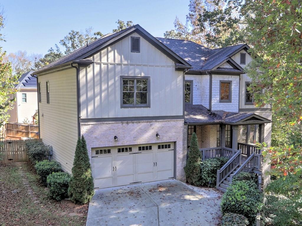 Lots of Trees removed & Property cleared to show off this million dollar 2016 built estate home! Your Dream Home for the Holidays in the Trifecta of Schools of Excellence: Sope Creek, Dickerson and Walton! You'll enjoy the discovery of this like new contemporary modern building on a very large lot. It was repainted and re-carpeted prior to listing. As you enter a two story foyer, the home unfolds to a sun filled 10 foot high open plan. The entry is flanked by a music room to your right, a dining room to your left, and an expansive great room straight ahead with tall windows everywhere. Once greeted & seated in the posh fireside setting, you'll be able to see the hostess in a chef's kitchen that's open for entertaining while cooking hearty meals & serving spirited cocktails from the side bar. The breakfast area can become a dance floor for larger events as it is centrally positioned between the kitchen & the great room, with a side door to the deck to catch an exit. For adventurous guests chasing a Midsummer Night's Dream, there is an entire private haven of woodsy area to the right of the home (also a nature buff's dream). If one needs a snooze you can retire to a main level guest room with an en-suite bath. If you ever need live entertainment, there are musicians of choice already familiar with this home to fill your music room (also a Ukrainian concert pianist giving private lessons at your home). The upper level is a cornucopia of private spaces. A master suite with two of the largest walk-in closets/dressing rooms seen in a million dollar home plus a gigantic master bath/spa. For children you have two bedrooms with their own bathrooms. The two additional rooms upstairs have been used as a private office away from all the bedrooms and a private massage room with a massage table included. There is a professional masseuse living in the community that caters to athletes & select local clientele. Finally there is a laundry room with large folding counter to deal with bedding & clothes. As a cherry on top there is the recently built out terrace level that hits a hole in one! It was designed to function as a great home entertainment zone with a massive recreation room including a full bar with a complete kitchen. Additionally there is a gaming room for your youngsters, and a large bedroom. The terrace level bathroom is a gem of design with a full shower included. This is truly a unique home in that every level has a full bedroom suite and every bedroom has a dedicated bathroom. Please call for an appointment. And Happy Holidays to all!