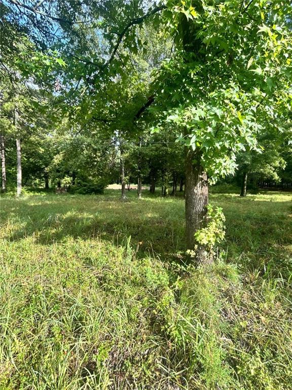 This 6.37-acre wooded parcel at 1040 Perryman Rd presents a rare opportunity for your dream build project. Natural setting with privacy and minimal restrictions, no HOA. Working well, already in place. Prec - test is scheduled to be done. Grading has started on where the house was going to be built.