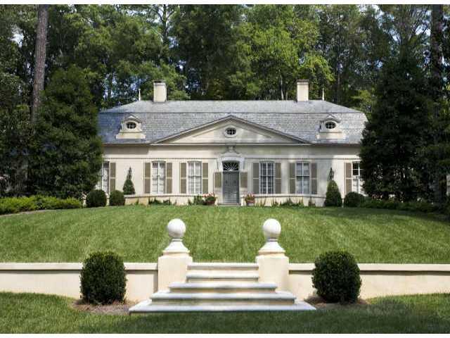 Gorgeous French Pavillion home by James Means. Features include a new main level master suite w/2 bedrooms, 12+ ceilings, new kitchen by Design Galleria w/2 dishwashers, 2 wet bars, new family room w/brick floor & stone fireplace. Guest suite over 3-car garage. Hard coat stucco over brick.